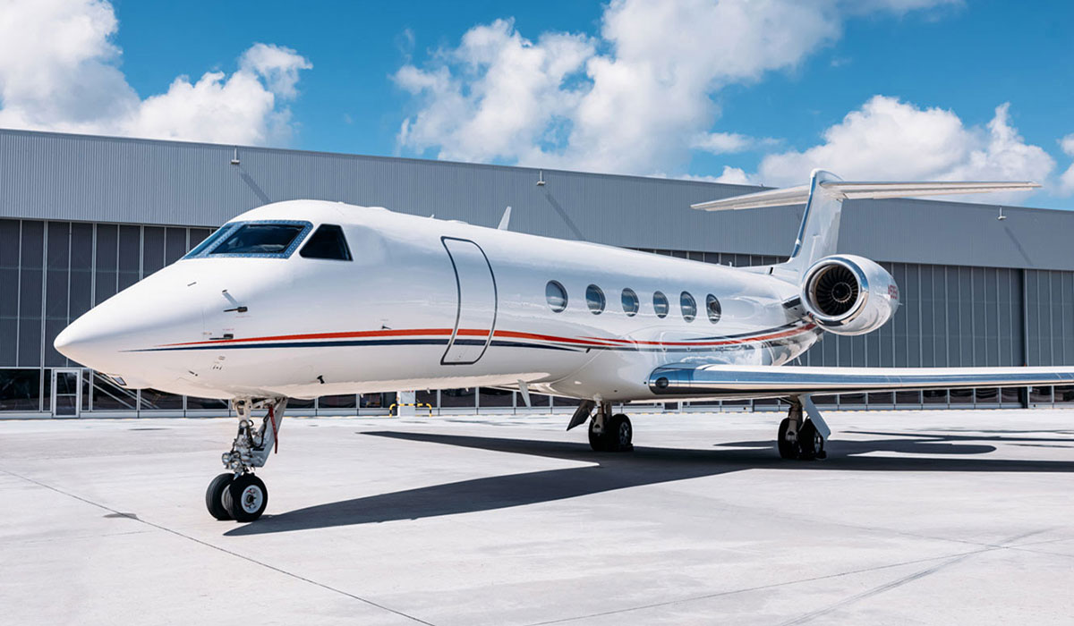 Ultra long range Gulfstream-style jet at hangar